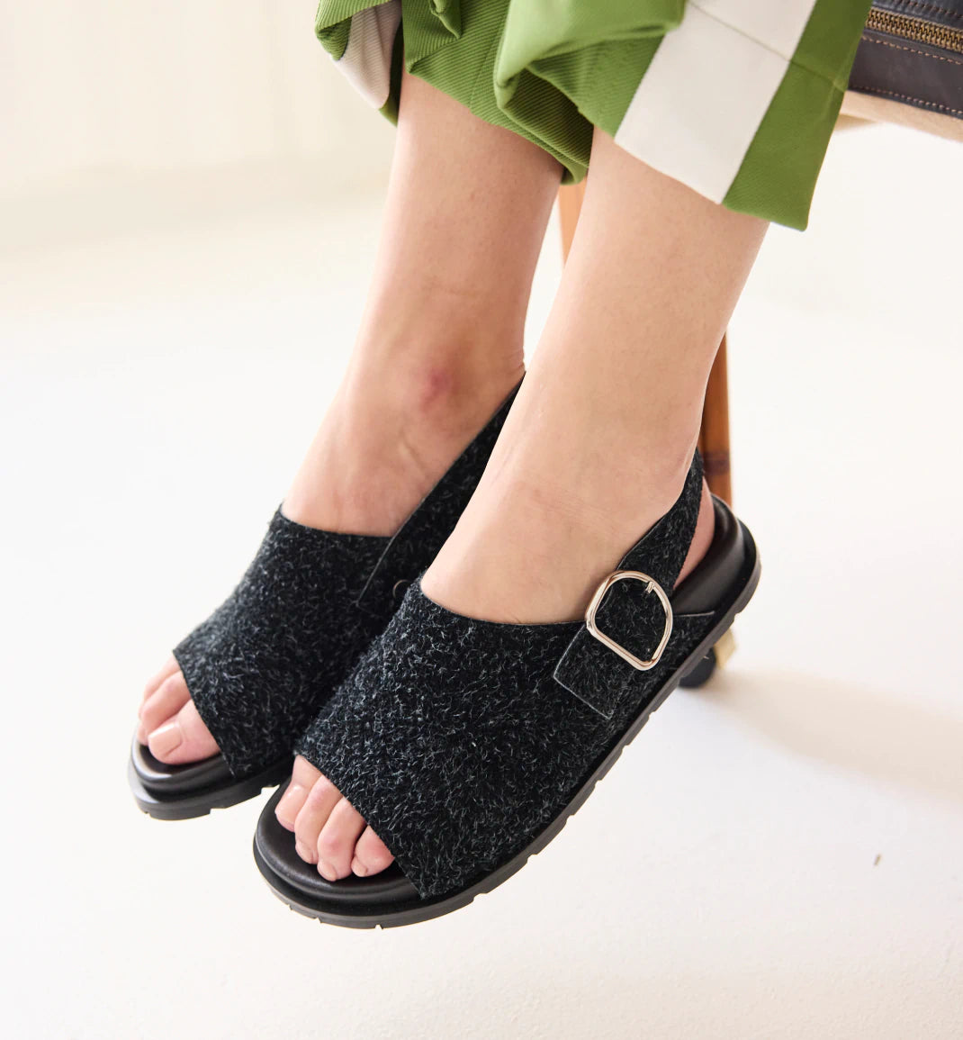 Elegant and sophisticated women's shoe stylesJana Buckle Slide | Black Shag Suede