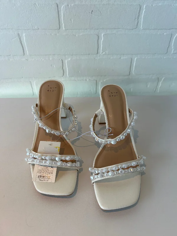 Practical and stylish women's shoes for travelSandals Heels Block By A New Day In Cream, Size: 11