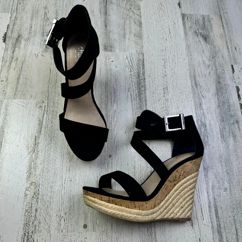 Bold and striking women's shoe fashionsBlack Sandals Heels Wedge Charles David, Size 7.5