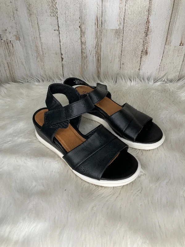 Effortlessly stylish women's shoe choicesBlack Sandals Heels Wedge Sofft, Size 7