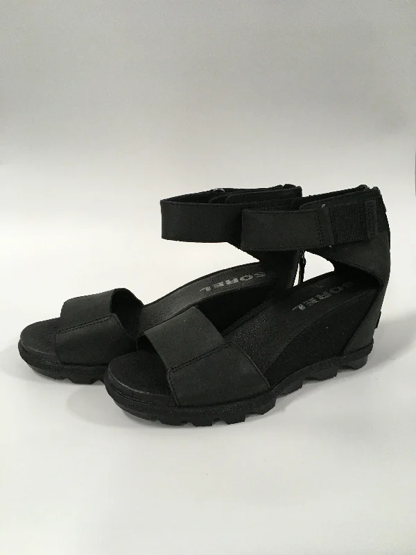 Luxurious and opulent women's shoe optionsBlack Sandals Heels Wedge Sorel, Size 8.5
