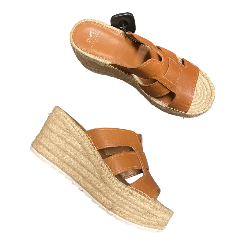 Luxurious and opulent women's shoe optionsBrown Sandals Heels Wedge Marc Fisher, Size 9.5
