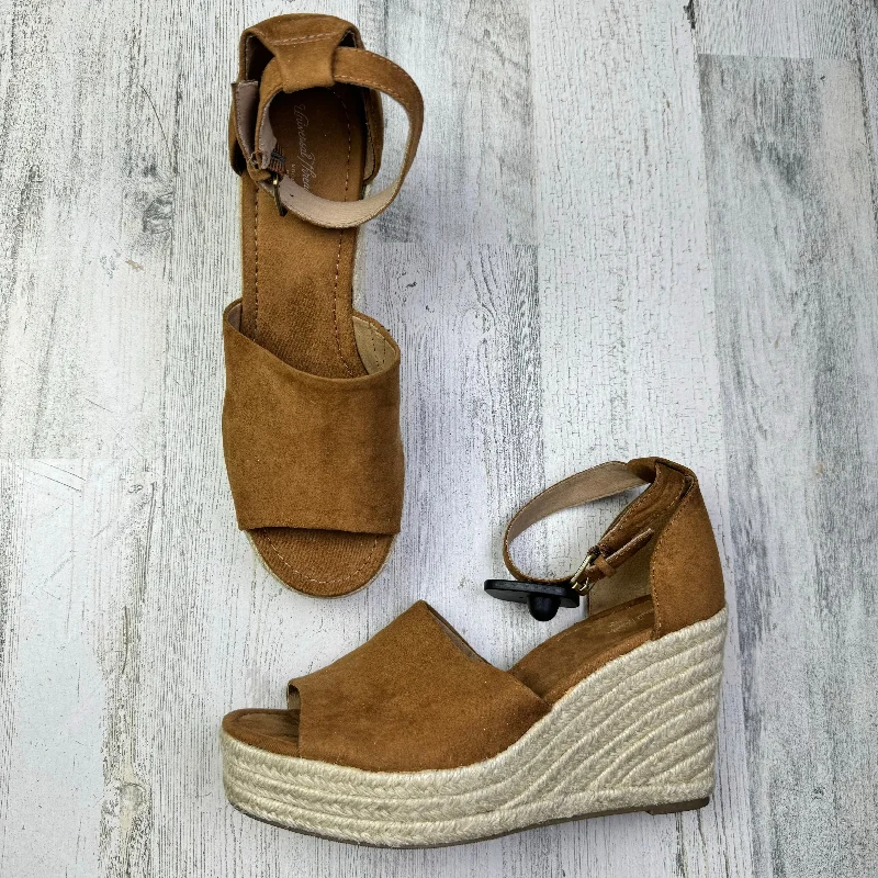 Bold and statement-making women's shoes for the bold and beautifulBrown Sandals Heels Wedge Universal Thread, Size 8.5
