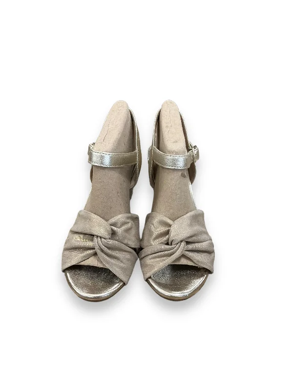Elegant and sophisticated women's shoes for mature womenGold Sandals Heels Wedge Clarks, Size 7