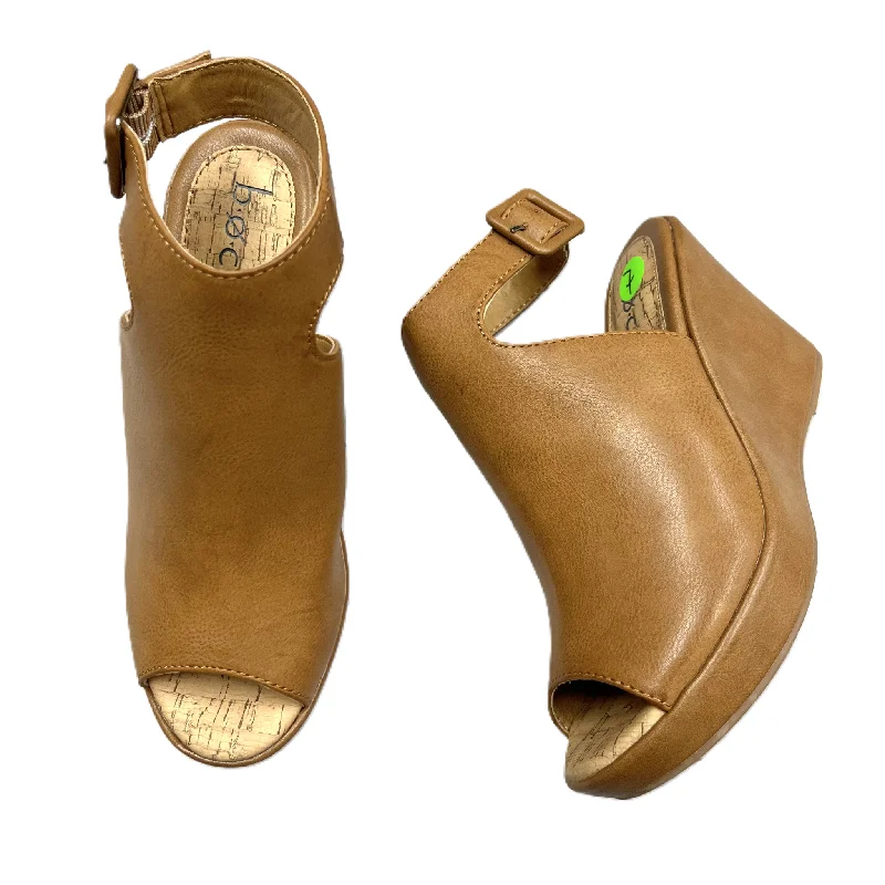 Vibrant and colorful women's shoe collectionsSandals Heels Wedge By Boc In Tan, Size: 7
