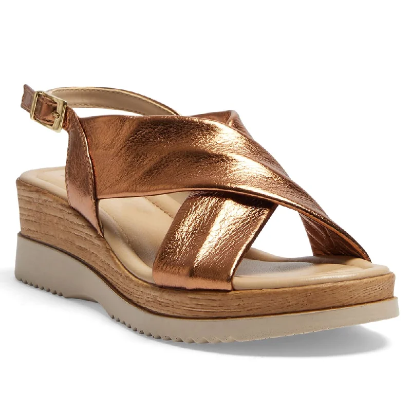 Chic and minimalist women's footwear trendsInca Wedge in Bronze Leather