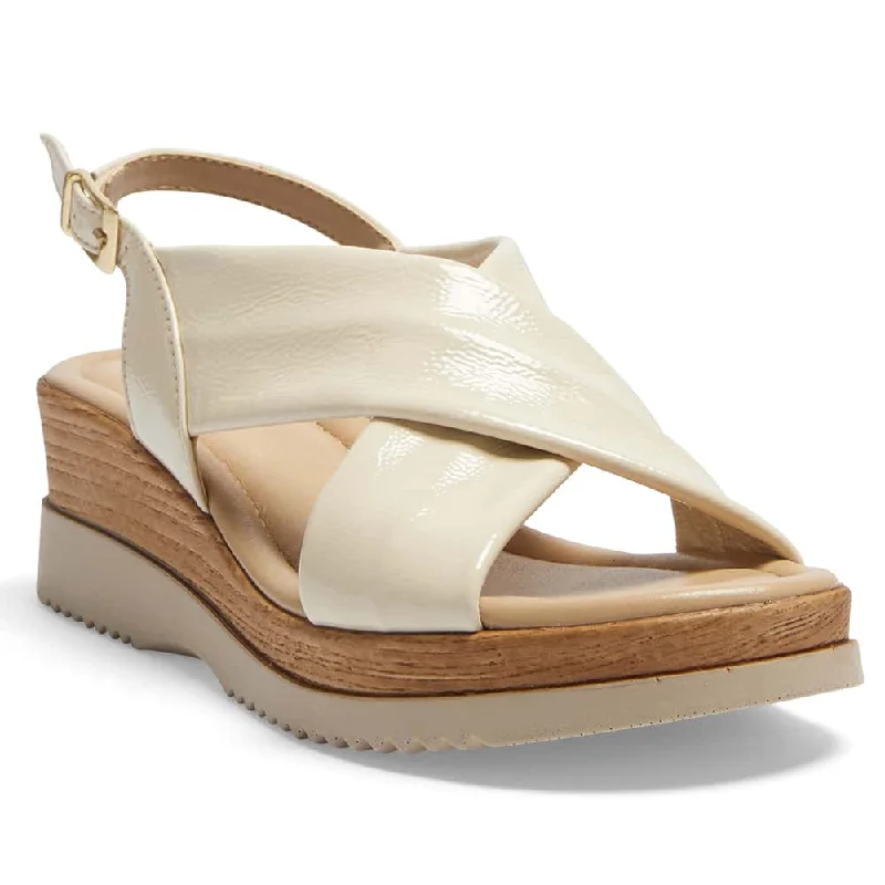 Luxurious and comfortable women's shoe options for special occasionsInca Wedge in Ivory Patent